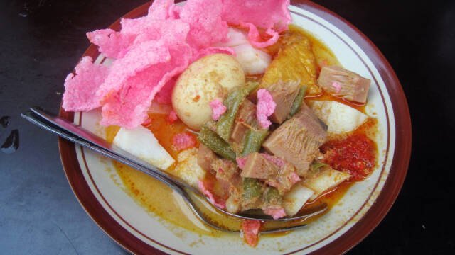 Lontong sayur with spoon