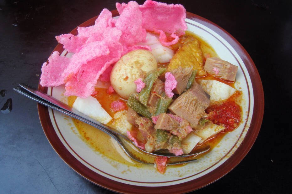 Lontong sayur with spoon